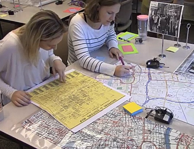 Photograph of participants completing the post-task using maps